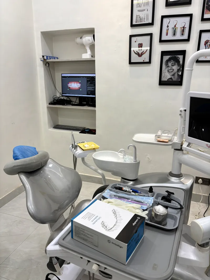 The dental chair, instrument tray and X-ray screen