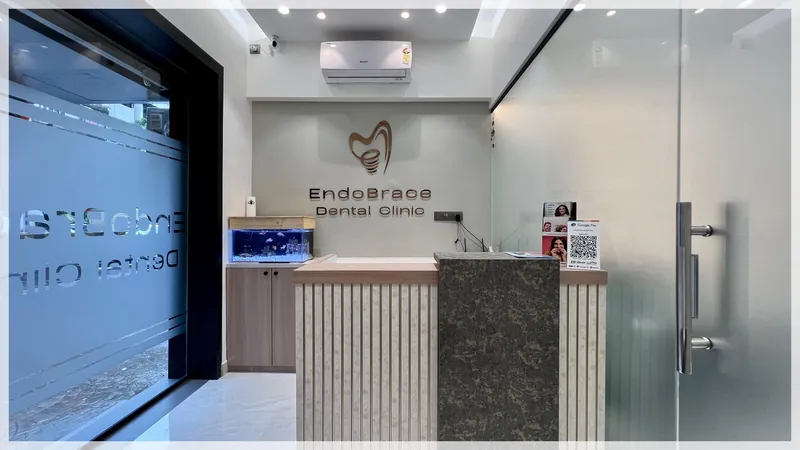 Reception and waiting area with the EndoBrace logo on the wall